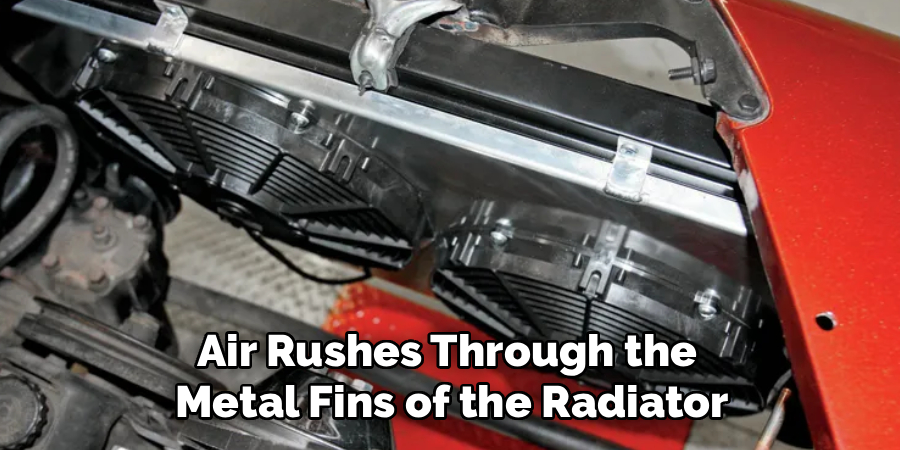 Air Rushes Through the
Metal Fins of the Radiator