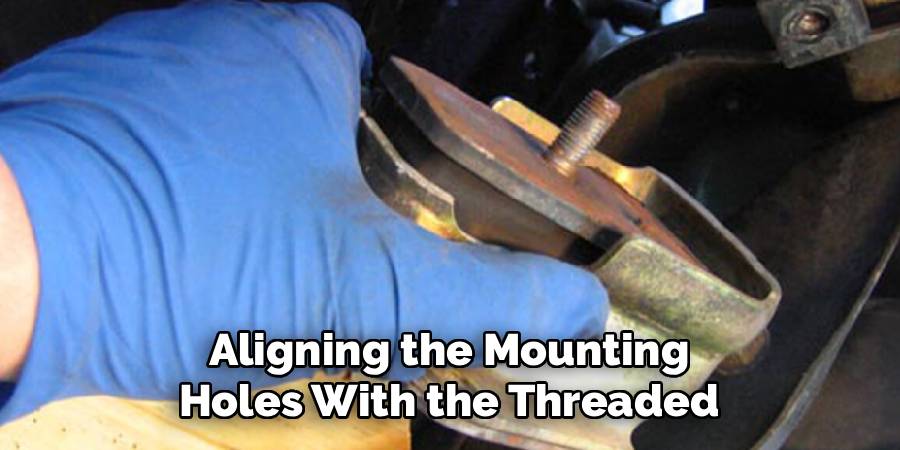Aligning the Mounting 
Holes With the Threaded 