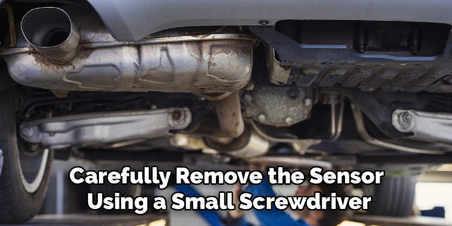  Carefully Remove the Sensor 
Using a Small Screwdriver