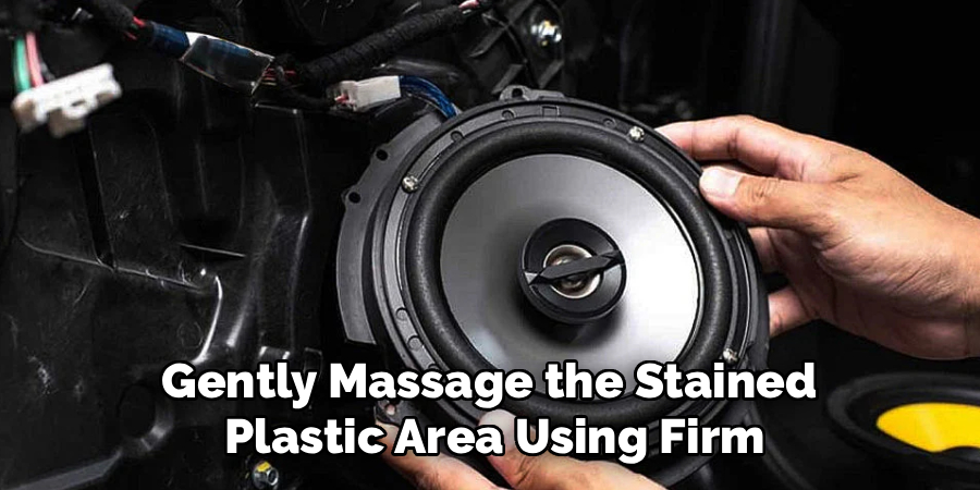 Gently Massage the Stained
Plastic Area Using Firm