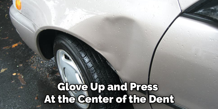 Glove Up and Press
At the Center of the Dent