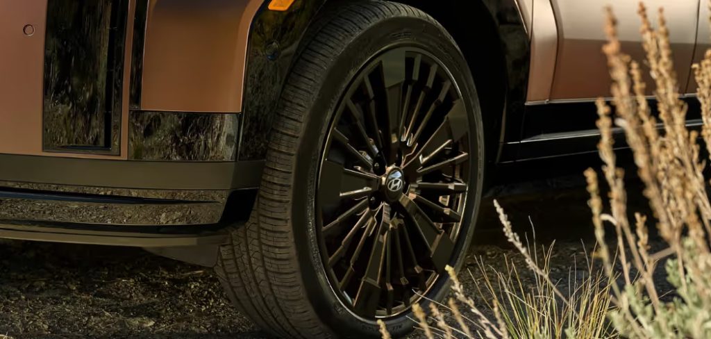 How to Put Spare Tire Back Under Car
