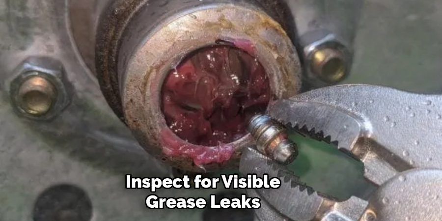 Inspect for Visible
Grease Leaks