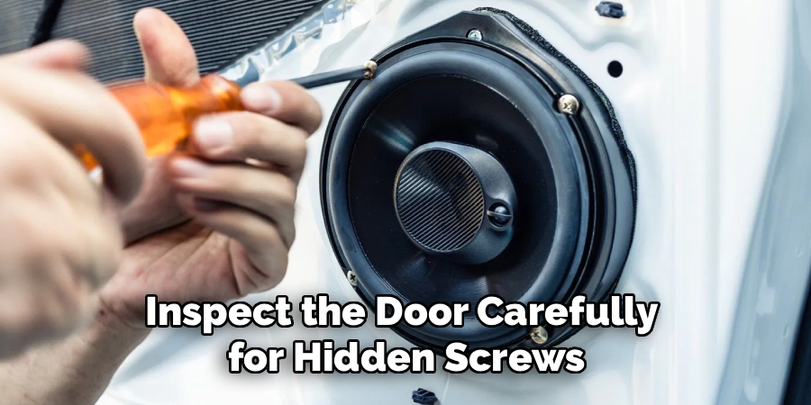 Inspect the Door Carefully
for Hidden Screws