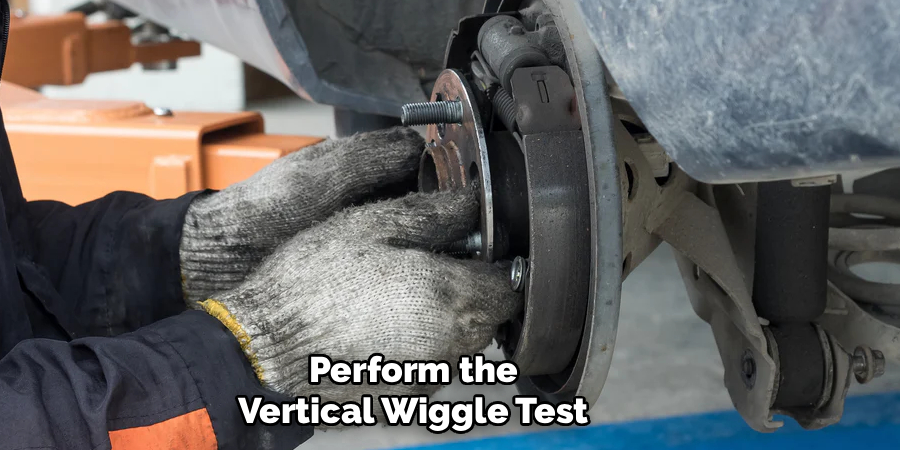 Perform the
Vertical Wiggle Test