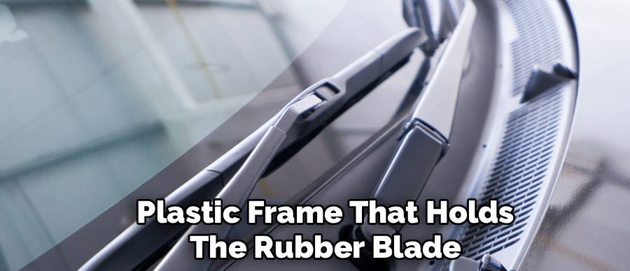 Plastic Frame That Holds
The Rubber Blade