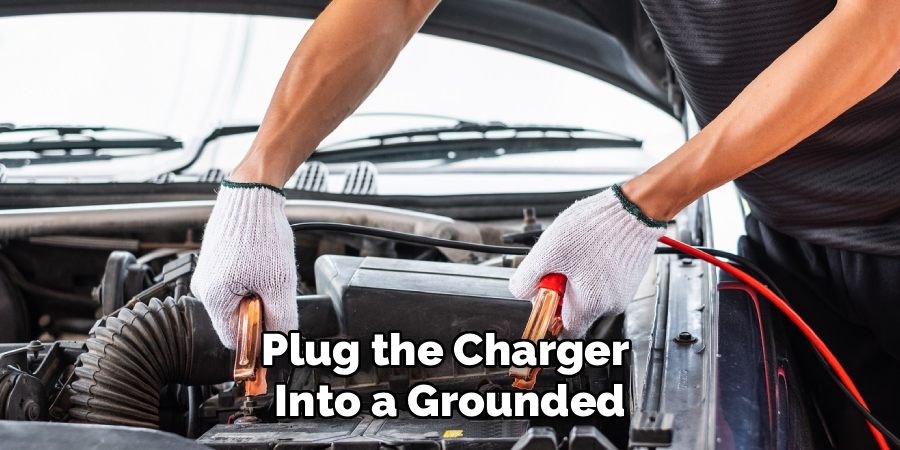 Plug the Charger
Into a Grounded