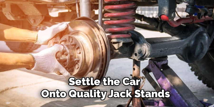Settle the Car 
Onto Quality Jack Stands