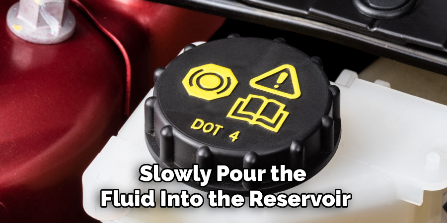 Slowly Pour the
Fluid Into the Reservoir