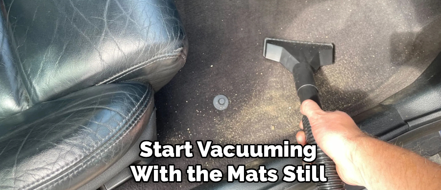 Start Vacuuming
With the Mats Still