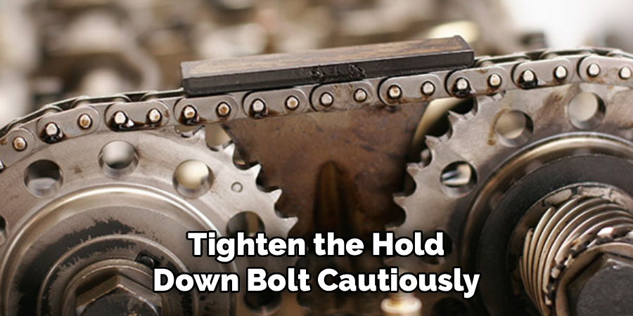 Tighten the Hold
Down Bolt Cautiously