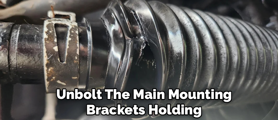 Unbolt The Main Mounting
Brackets Holding
