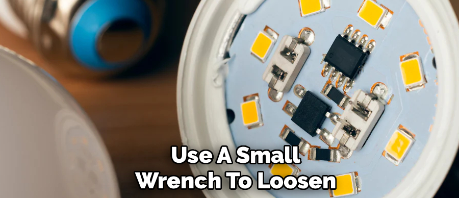 Use A Small
Wrench To Loosen