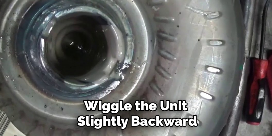 Wiggle the Unit
Slightly Backward