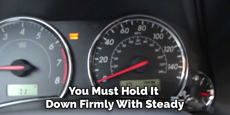 You Must Hold It 
Down Firmly With Steady